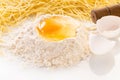 broken egg in flour and pasta Royalty Free Stock Photo