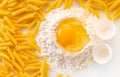 broken egg in flour and pasta Royalty Free Stock Photo