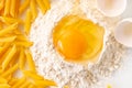 broken egg in flour and pasta Royalty Free Stock Photo