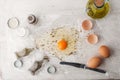 Broken egg with herbs mix and olive oil Royalty Free Stock Photo