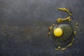 Yellow yolk and mustard beans on black table,top view