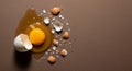 Broken Egg with Vibrant Yolk on Brown Surface Royalty Free Stock Photo