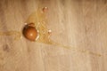 Broken egg on wooden floor