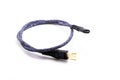 Broken USB braided cable on white isolated background Royalty Free Stock Photo