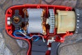 Broken electric screwdriver,disassemble the disassembled drill in the service center Royalty Free Stock Photo