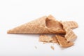 Broken empty sugar waffle cones on white background