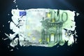 Broken Euro paper money on a green background