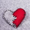 Broken felt heart Royalty Free Stock Photo