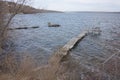 Broken fishing bridges on the river after a strong wind Royalty Free Stock Photo