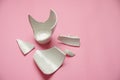 Broken fragments of a crack broken white cup. Royalty Free Stock Photo
