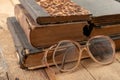 Broken frame from glasses. Old book and glasses Royalty Free Stock Photo