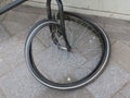 Broken frontwheel of an black bicycle in the streets of Amsterdam Royalty Free Stock Photo