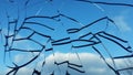 Broken glass against the sky. The broken window. Royalty Free Stock Photo