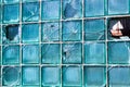 Broken glass for background pattern. Broken window with a bullet hole in the middle Hole in the window. Crash texture Royalty Free Stock Photo