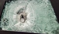 broken glass. Car glass cracked from an accident. Armored glass after impact. glass reinforced with a film after being Royalty Free Stock Photo