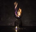 Broken glass on fire on textured background Royalty Free Stock Photo