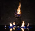 Broken glass on fire on textured background Royalty Free Stock Photo