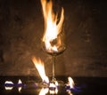Broken glass on fire on textured background Royalty Free Stock Photo