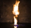 Broken glass on fire on textured background Royalty Free Stock Photo