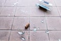 Broken glass on the floor, alcohol abuse Royalty Free Stock Photo