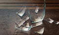 broken glass glasses mirror on wooden floor , generated by AI Royalty Free Stock Photo