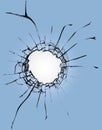 Broken glass with a hole on a blue background and with a light in the center. Texture of cracks on a broken window from Royalty Free Stock Photo