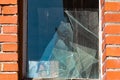 Broken glass in an old window.Criminal incidents.