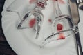 broken glass on plates kitchenware table setting tableware Royalty Free Stock Photo