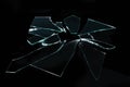 Broken glass with sharp pieces on black background Royalty Free Stock Photo