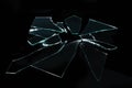 Broken glass with sharp pieces on black background Royalty Free Stock Photo