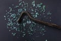 Broken glass with sharp Pieces over dark grey background. Destruction, danger. Royalty Free Stock Photo