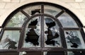 Broken glass in the window of old abandoned hotel Royalty Free Stock Photo