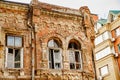 broken glass in windows of an old ruined building. Royalty Free Stock Photo