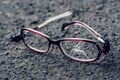 Broken glasses fell on the asphalt. Accident Royalty Free Stock Photo