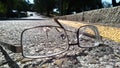 Broken glasses on the road Royalty Free Stock Photo