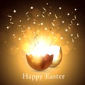 Broken golden easter egg with light confetti on a gold background. Bokeh lights glare cracked golden shell. Happy easter concept Royalty Free Stock Photo