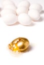 Broken golden egg Royalty Free Stock Photo