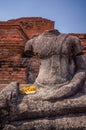 Broken headless Buddha image