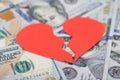 Broken heart on dollar bills Royalty Free Stock Photo