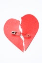Broken heart joined with safety pin Royalty Free Stock Photo