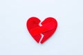 Broken heart with a patch on a white background closeup Royalty Free Stock Photo