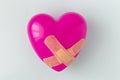 Broken heart patched with a patch. Royalty Free Stock Photo