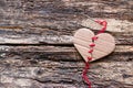 A broken heart is sewn with a red thread Royalty Free Stock Photo