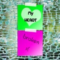 Broken heart text on sticky paper
