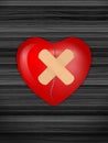 Broken heart on wooden backfound Royalty Free Stock Photo