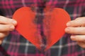 Broken hearted. Valentines day concept. woman holding broken heart Royalty Free Stock Photo