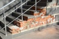 Broken house steps foundation with water leaks outdoor. Damaged stair case need to repair Royalty Free Stock Photo