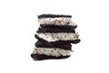 Broken ice cream sandwich filling with cookies and cream flavour isolated on white background