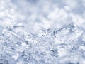 Broken ice cubes, winter background, texture of ice crystals. Frozen water