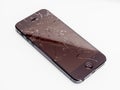 Broken iPhone with cracked screen Royalty Free Stock Photo